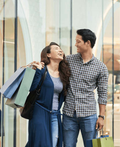 happy-shoppers-laughing-carefree-shopping-mall